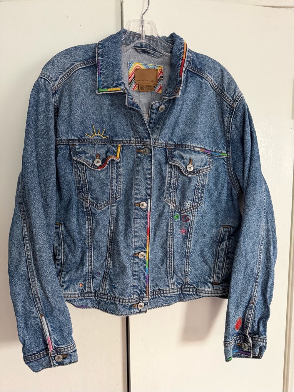 American Eagle Outfitters Blue Denim Jacket with Rainbow Label Accents
